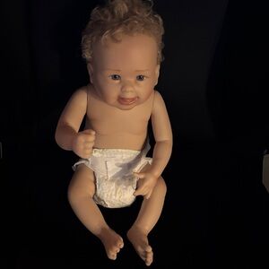 Realistic Baby Doll with Curly Hair